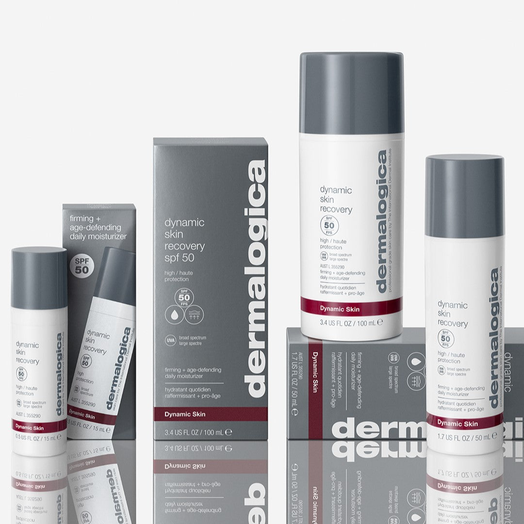 Hautpflegeprodukte von Dermalogica, einschließlich Dynamic Skin Recovery SPF 50 | Tagespflege mit SPF wird neben den Verpackungen auf einer reflektierenden Oberfläche präsentiert und bietet UV-Schutz und wirksame Anti-Age-Tagespflege gegen lichtbedingte Hautalterung.